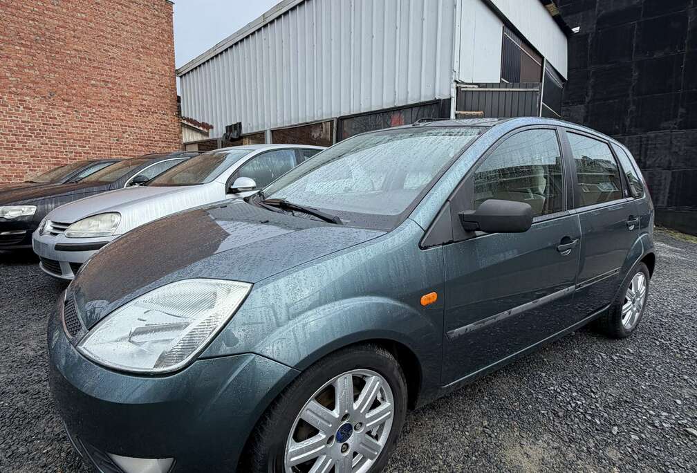 Ford 1.4i 16v Ghia DEJA PRETE A IMMATRICULER