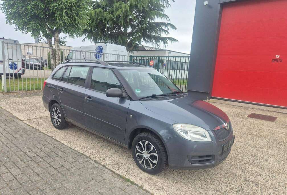 Skoda 1.2i Combi -  Airco + Keuring - Garantie