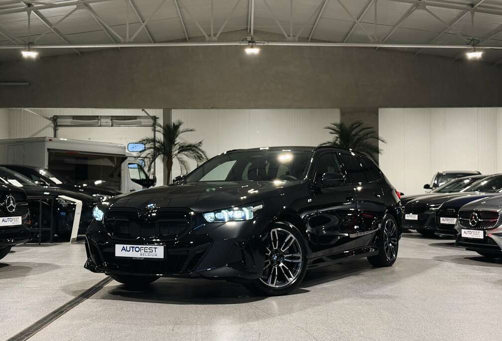 BMW iA Touring M-Sport - Fabrieksgarantie