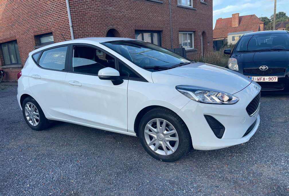 Ford 1.1i Benzine,Airco,Cruise control,39.000km.1e eigenaar,