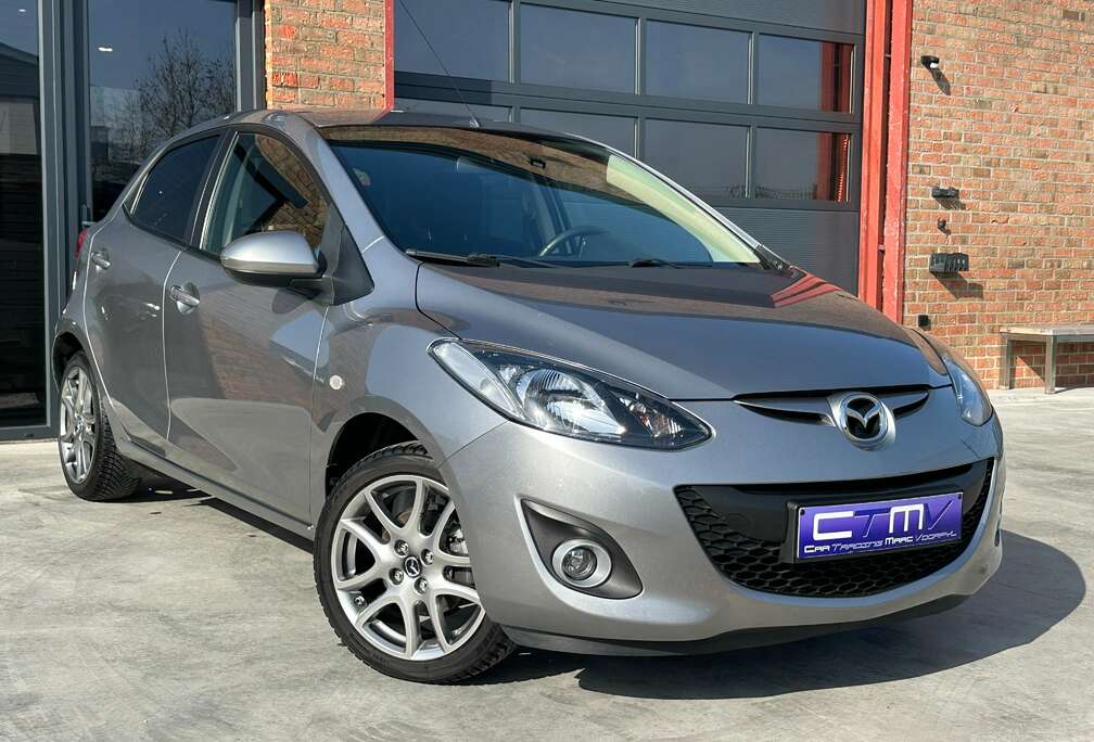 Mazda 1.3i 5dr Airco - Navi - Trekhaak - 1ste Eigenaar