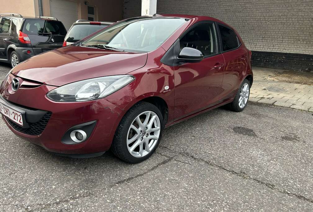 Mazda 2 1.3i Sport Navigator GPS AIRCO 12 mois de garantie