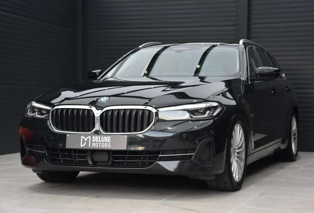 BMW e xDrive Touring Zetelverwarming Navi Camera PDC