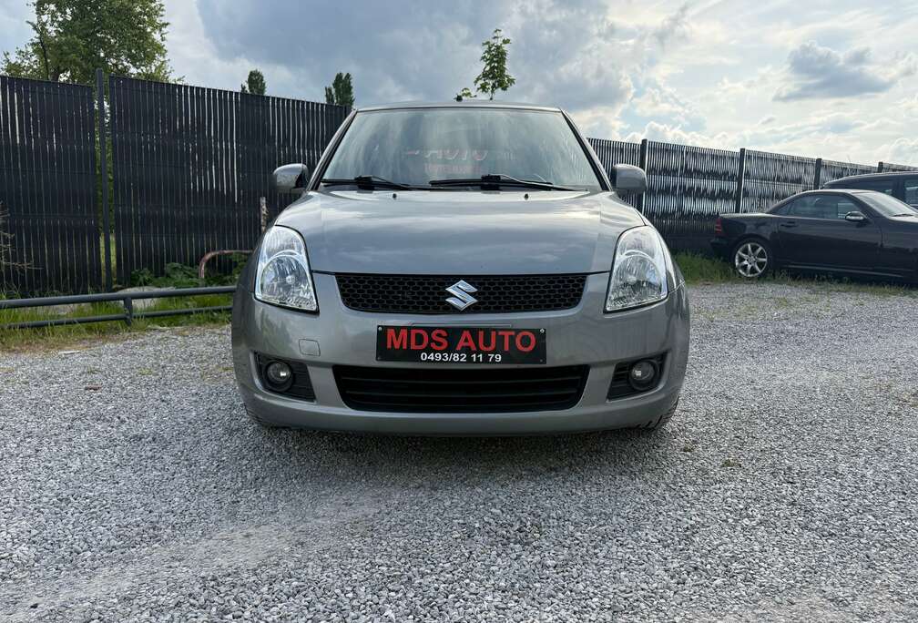 Suzuki 1.3i GLX  X.tension