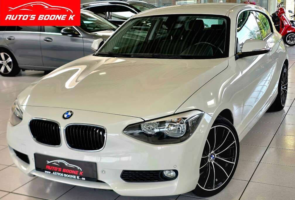 BMW Zetelverwarming / Parkeersensoren / Afneembare trekhaak / Airco / Garantie