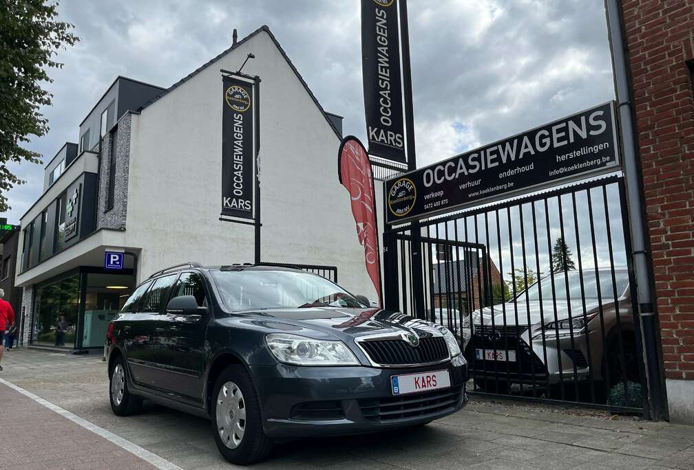 Skoda SW 1.6i/NIEUWST/AIRCO/SENSOREN/RESERVEWIEL