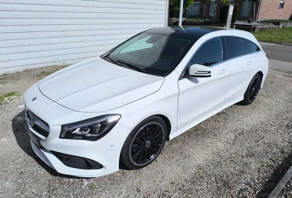 Mercedes-Benz CLA 180 shooting break amg pack met zwarte 18 inch amg velgen / panoramisch dak / navigatie / achteruitrijcamera / led