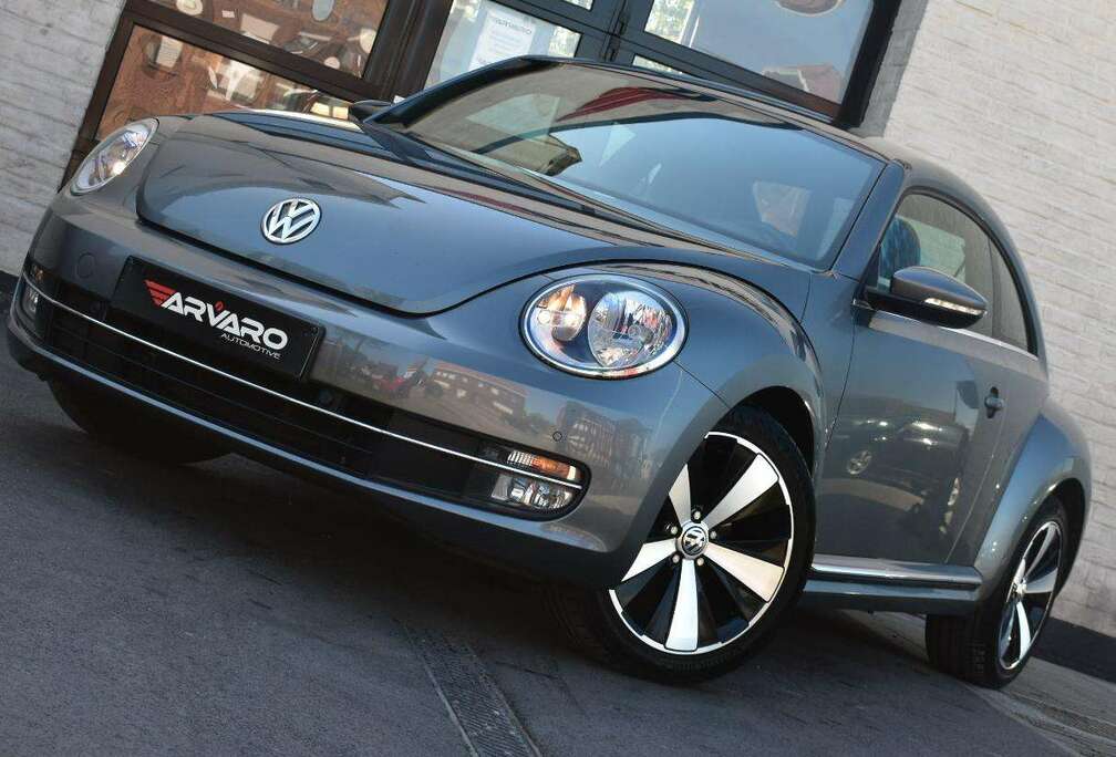 Volkswagen 1/2 TSI Design / PDC / Cruise / Verw Zetels / Garantie
