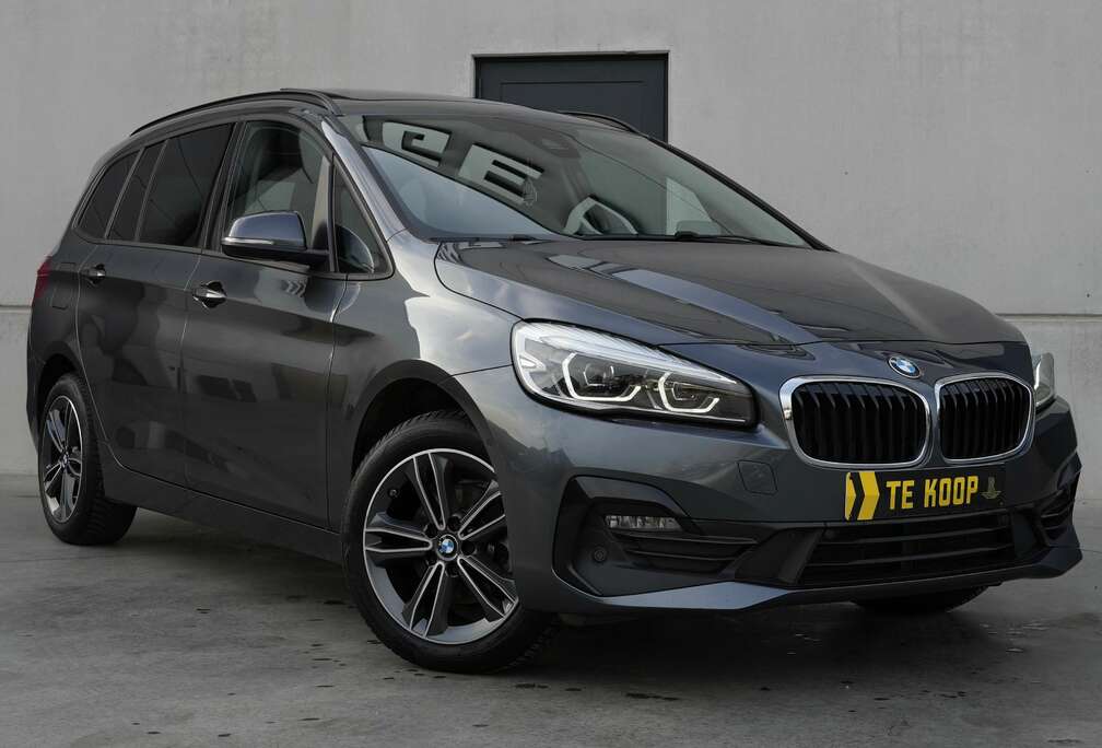 BMW Sport Line | 7 zitplaatsen | Panoramadak | Head-Up | Harman Kardon | Trekhaak | Camera | Navi | Zetelverwarming