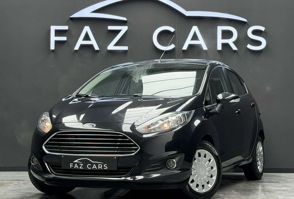 Ford 1.6 TDCi Titanium * 1ER PROP + CLIM + GARANTIE *