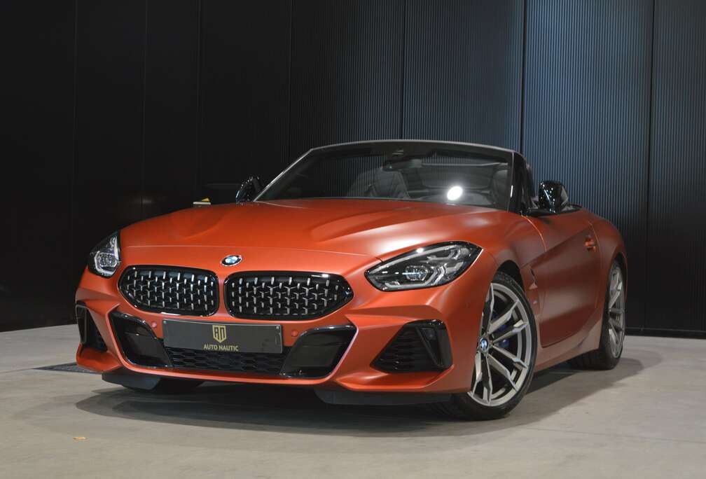 BMW 40i AS - 23.000 km - Full option - Frozen orange metallic