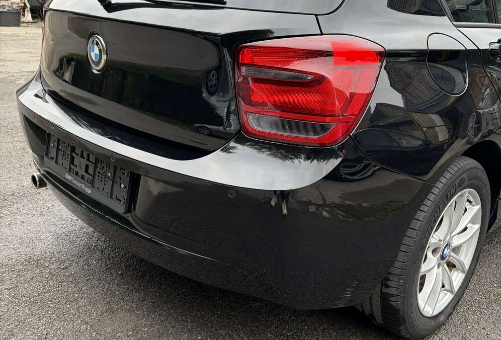 BMW 116i Crossed Flag