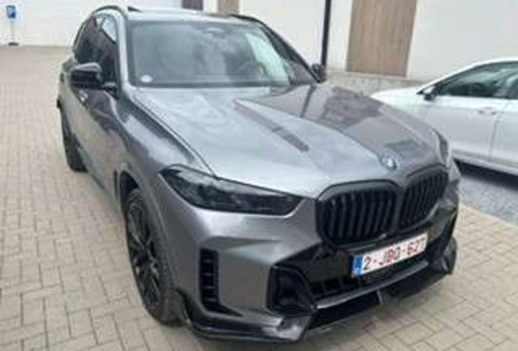 BMW xDrive50e M Sport Pro / Pano / Carbon pack int / Multi M Seats / Vent - Heat / Iconic Glow / Trekhaak / Camera / 22\