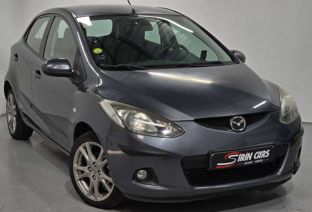 Mazda 1.3i  Airco  Aide au stationnement  GARANTIE 12MOIS