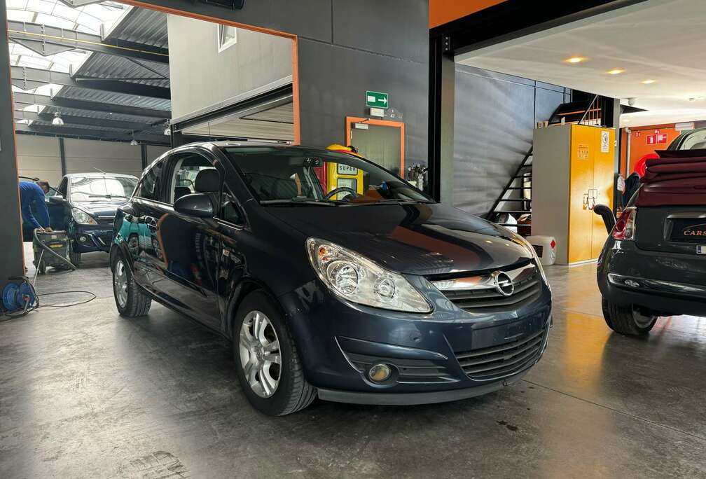 Opel 1.2i - 97.459 KM   A/C - 3 PORTES - RADIO CD/MP3