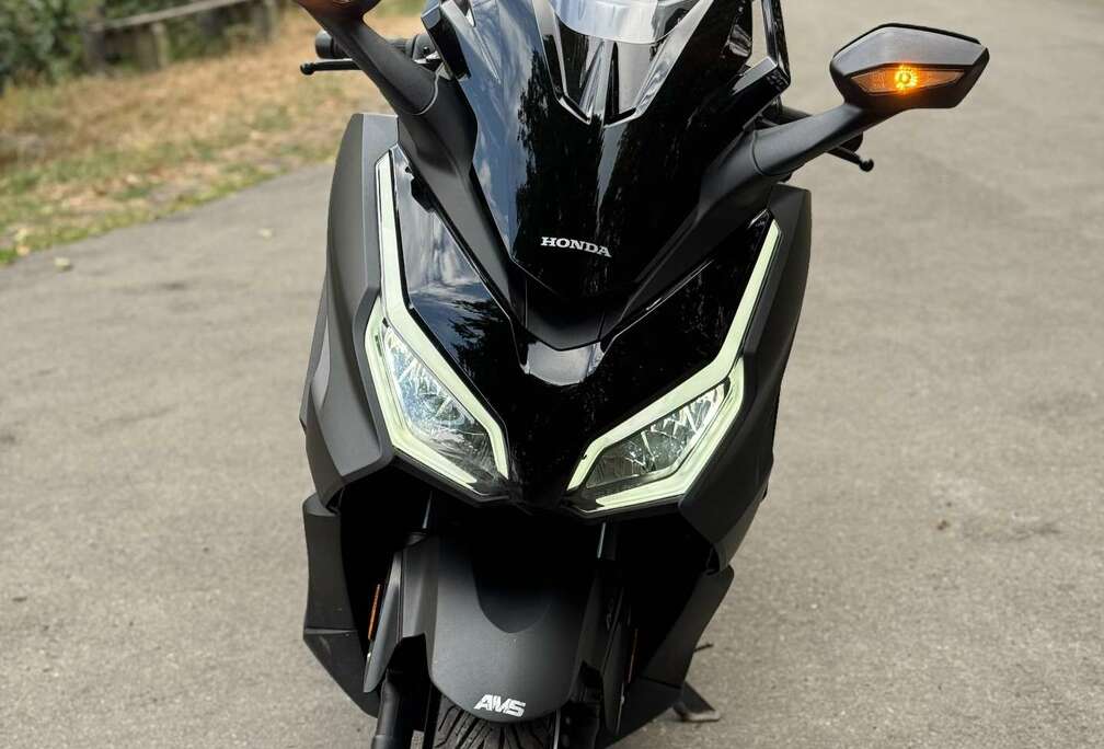 Honda top case, poignées chauffantes...