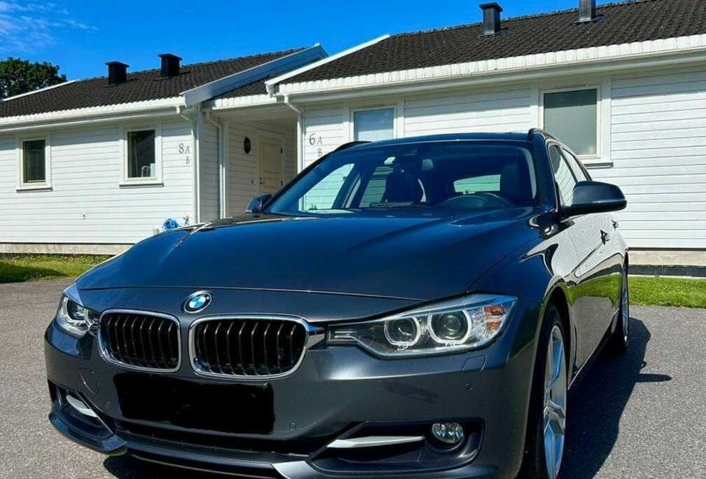BMW 318d 143 ch 118 g Business A