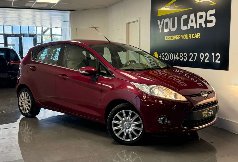 Ford 1.4i Ghia 1 Jaar Garantie