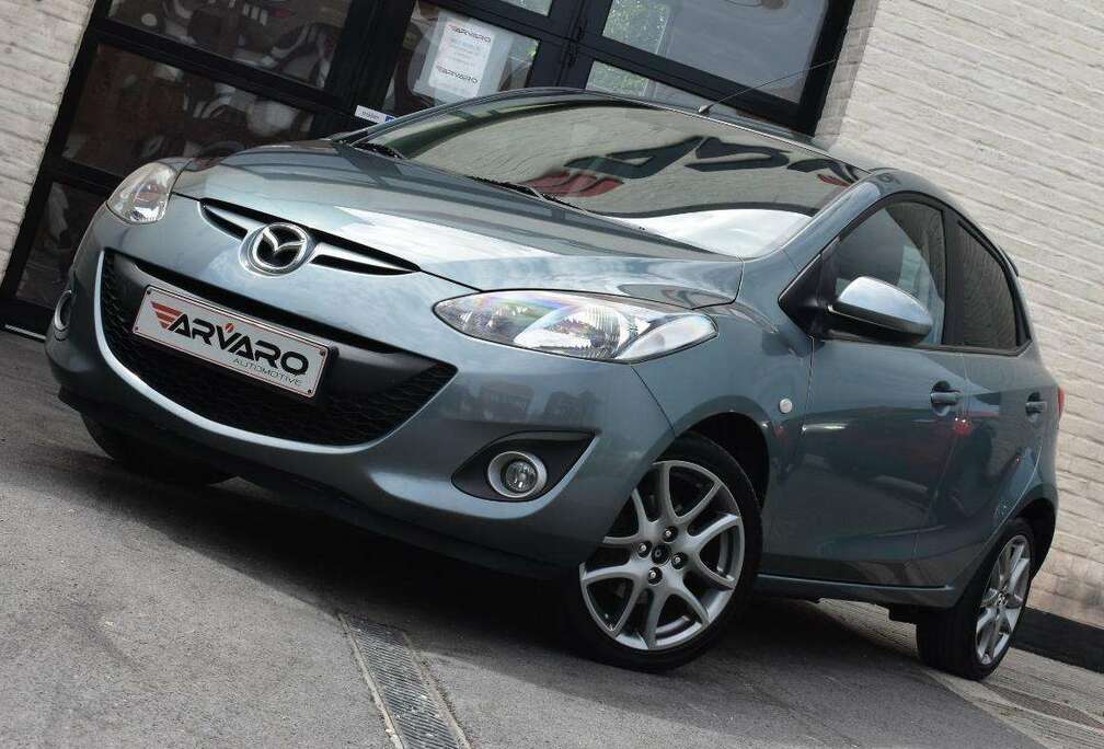 Mazda 1.3i Sport Navigator / PDC / Verw Zetels / Airco / Topstaat / Garantie