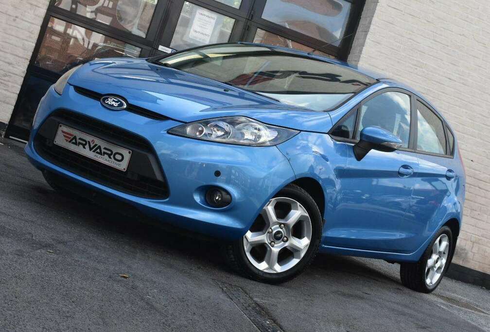 Ford 1.4i Titanium / PDC / Verw Zetels / Airco / Garantie