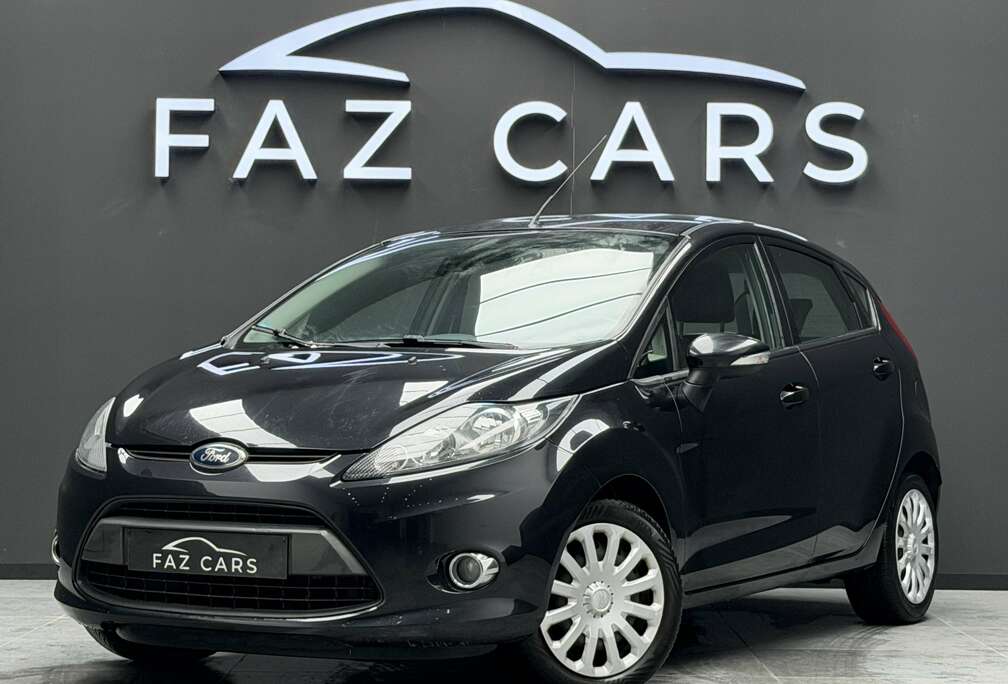Ford 1.25 Ambiente * 1ER PROP + CLIM + BLUETOOTH *