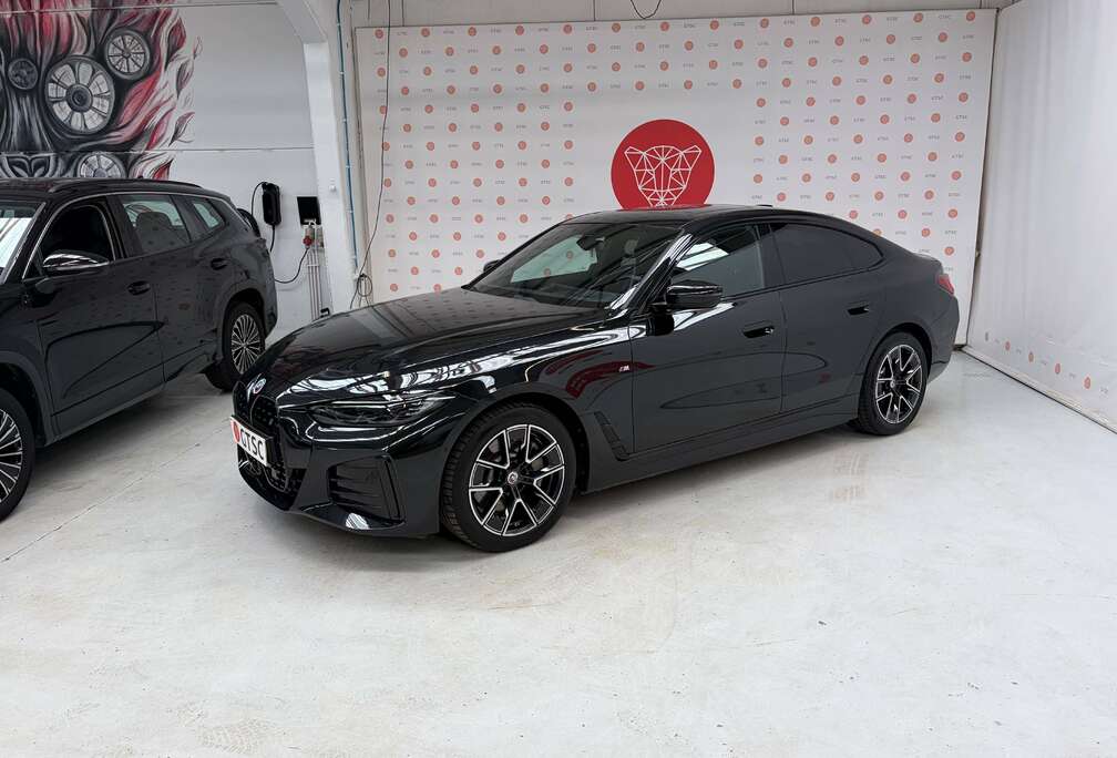 BMW Gran Coupe 83.9 kWh eDrive40 Pano dak M pakket Volleder Carplay Gloss pakket Camera Head up Active guard