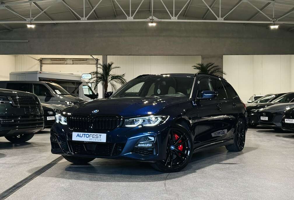 BMW e Touring M-Sport PRO Tanzanitblauw - 12 Mnd Garantie
