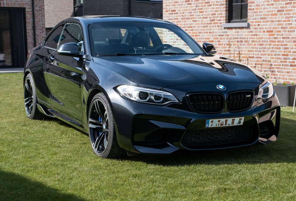 BMW Coupé DKG - 1e eigenaar | 57.500 km | BMW onderhouden | OEM M Performance Carbon