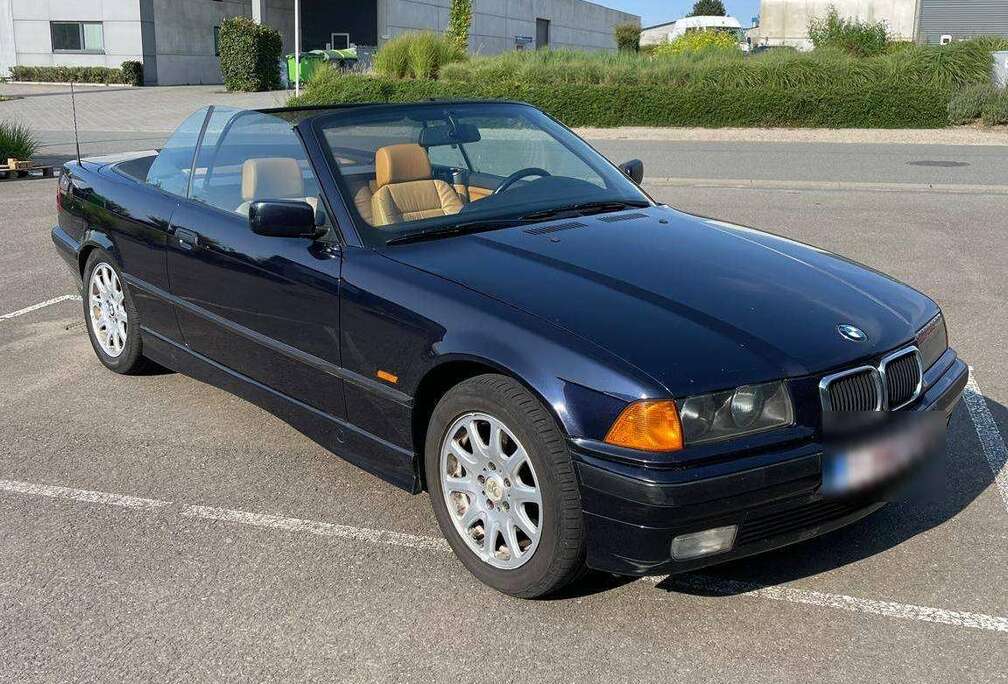 BMW 320i Magritte