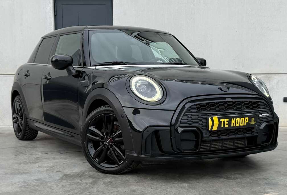 MINI JCW Pack * CarPlay * Head-Up Display * Comfort Access * Parkeerassistent * Stoelverwarming * Navi * LED * Driving Modes