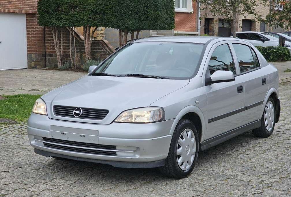 Opel 1.6i 16v PRTE  IMMATRICULER + FEUILLE ROSE