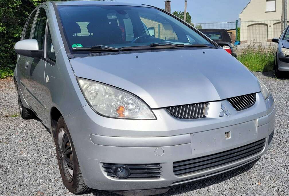 Mitsubishi 1.1i AL BLANCO GEKEURD ROOS FORM AIRCO euro 4 2006