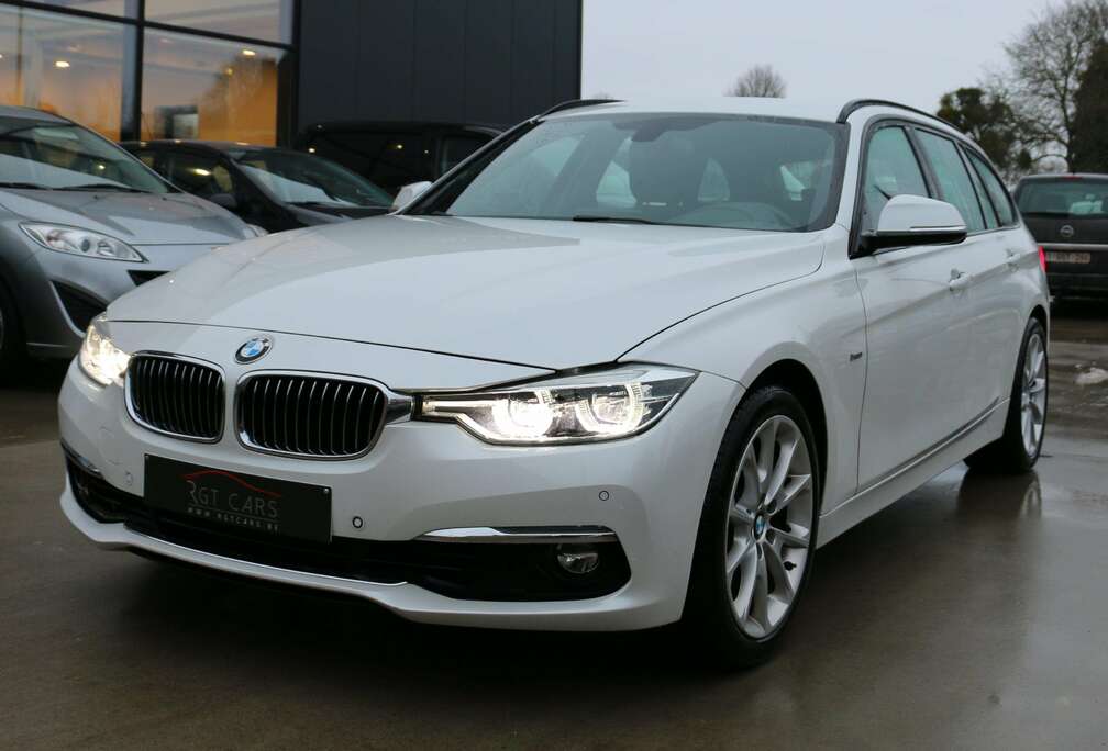 BMW I Touring Aut. Luxury Line +1 JAAR GARANTIE TRAXIO