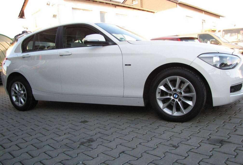 BMW 116i Crossed Flag