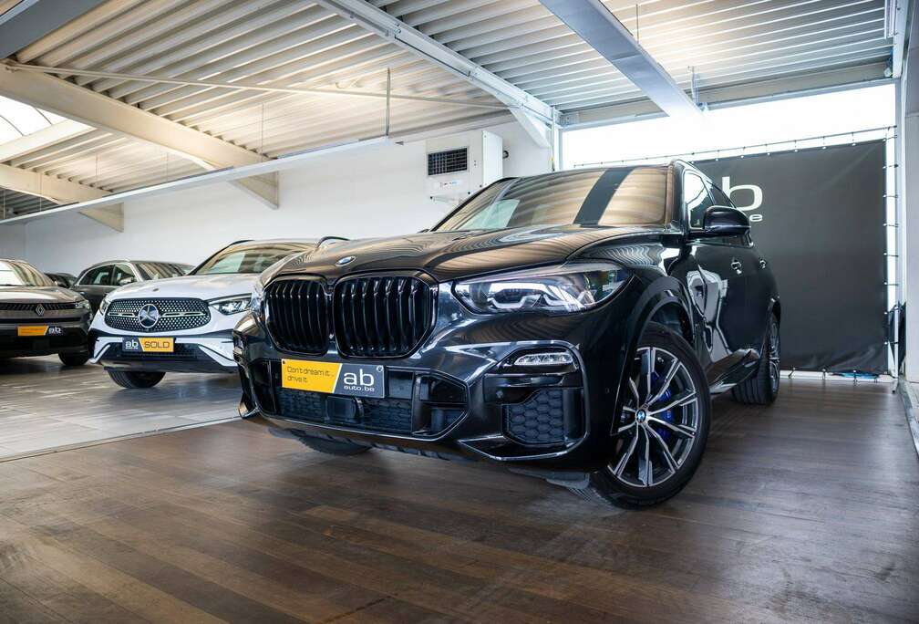 BMW 40i M Sport, M sportuitlaat, adaptieve M ophanging, Merino comfortzetels, Harman Kardon, 360° camera