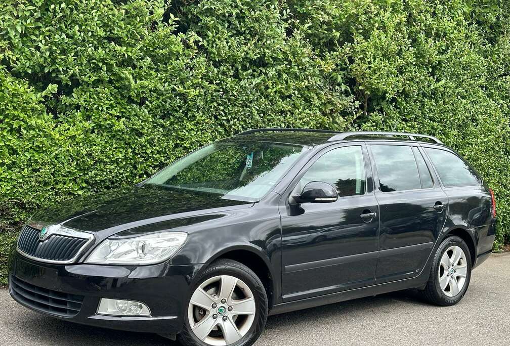 Skoda SW 1.6 TDi+BOITE AUTO+NAVI+AIRCO+CUIR+JANTES+EU 5