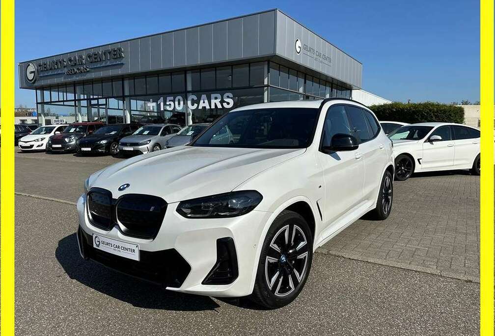 BMW M-Pack - 80kWh - Pano - Parelmoer wit - €39.990 AL