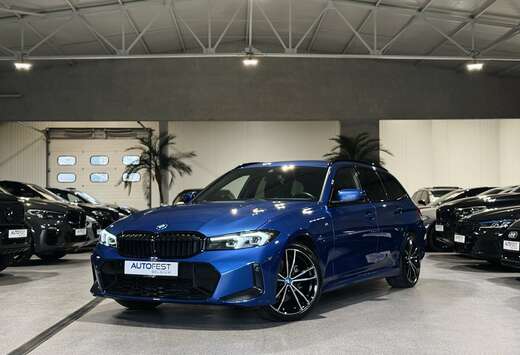 BMW iA Touring M-Sport Portimao Blauw - Garantie