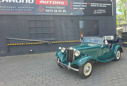 MG td