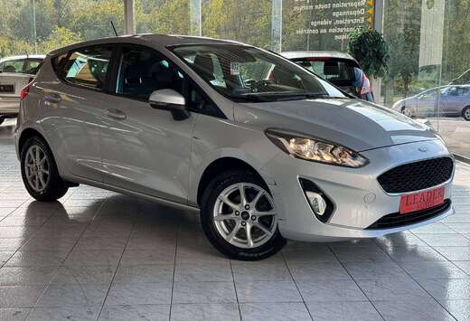 Ford 1.1 ESSENCE 71CV - AIRCO - CRUISE - NAVIGATION - ...