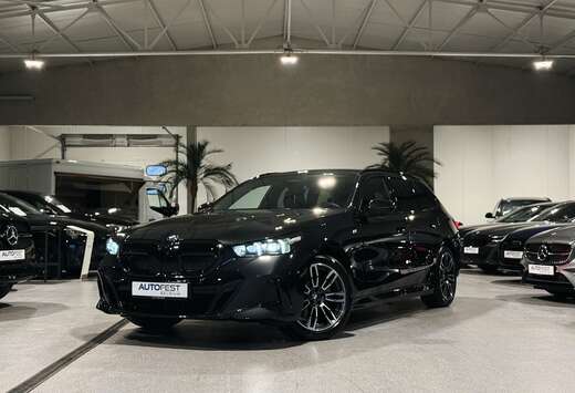 BMW iA Touring M-Sport - Fabrieksgarantie