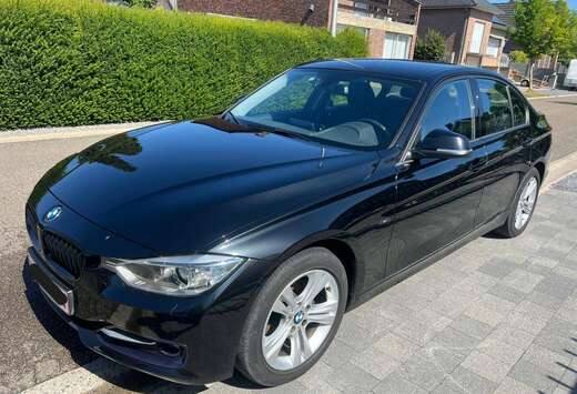 BMW Sportline - lederen zetels - camera - regensensor