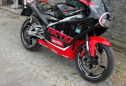 Bonjour je vend à contre coeur mon Aprilia rs125.