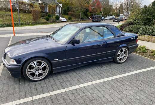 BMW 320i  Magritte