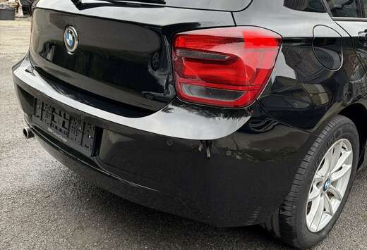 BMW 116i Crossed Flag