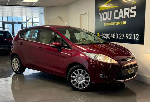 Ford 1.4i Ghia 1 Jaar Garantie