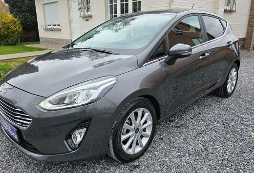 Ford **1.1ESS*75CH*TITANIUM*CLIM*JANTES*GARANTIE 12 M ...