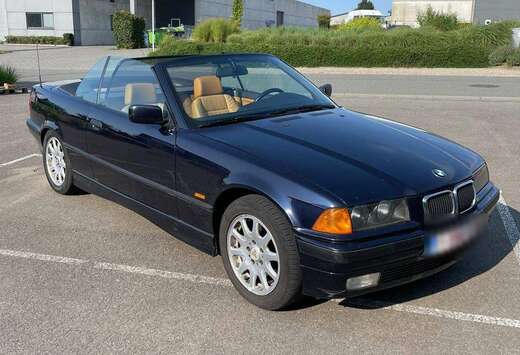BMW 320i Magritte