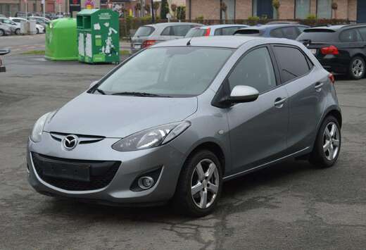 Mazda 1.3i Sport Navigator weinig kilometers
