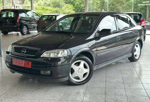 Opel 1.4 ESSENCE 90CV - 5 PORTES - AUTOMATIQUE - AIRC ...